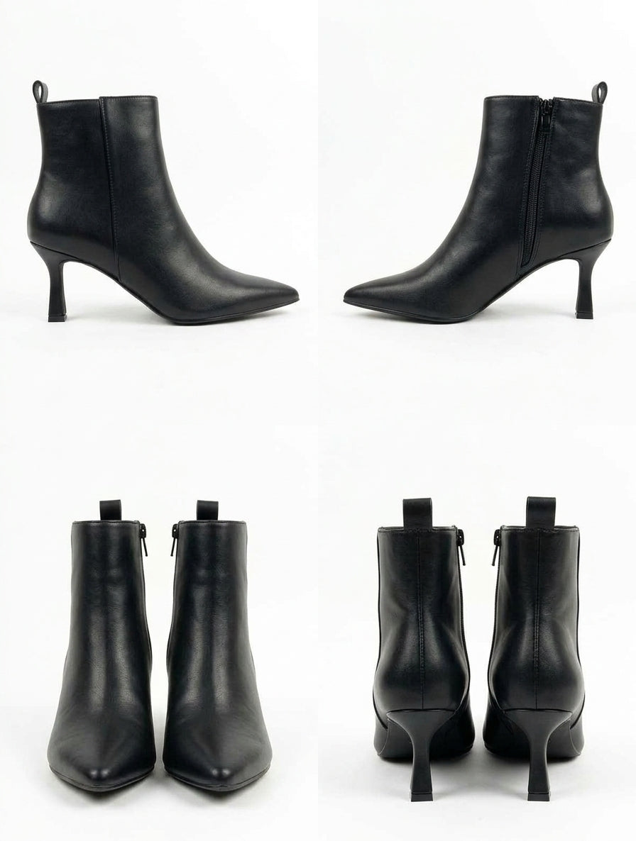 Botines de Piel Negra con Tacón Fino Esculpido y Cuello Recto